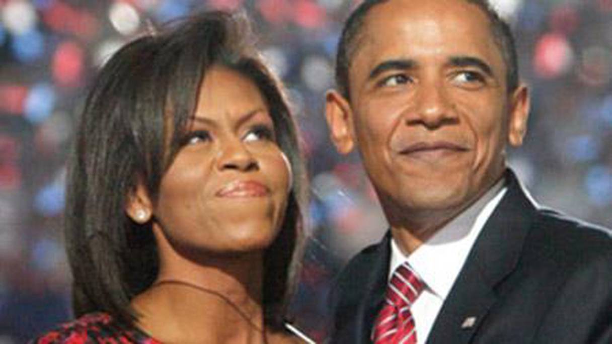 الرئيس الأمريكي باراك أوباما وزوجته ميشيل

