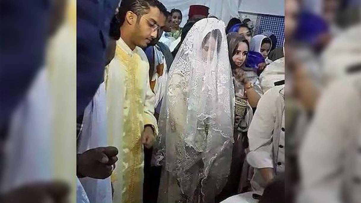 كريمة الرئيس الموريتاني وزوجها بلباس مغربي
