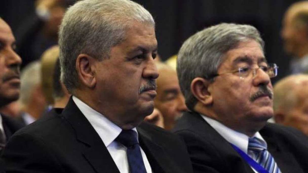 الوزيرين الجزائريين الأولين السابقين أحمد أويحيى وعبد المالك سلال
