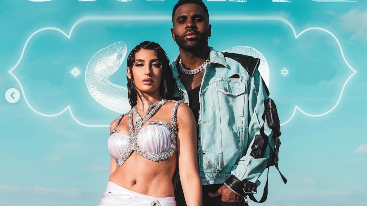 نورا فتحي وجيسون ديرولو