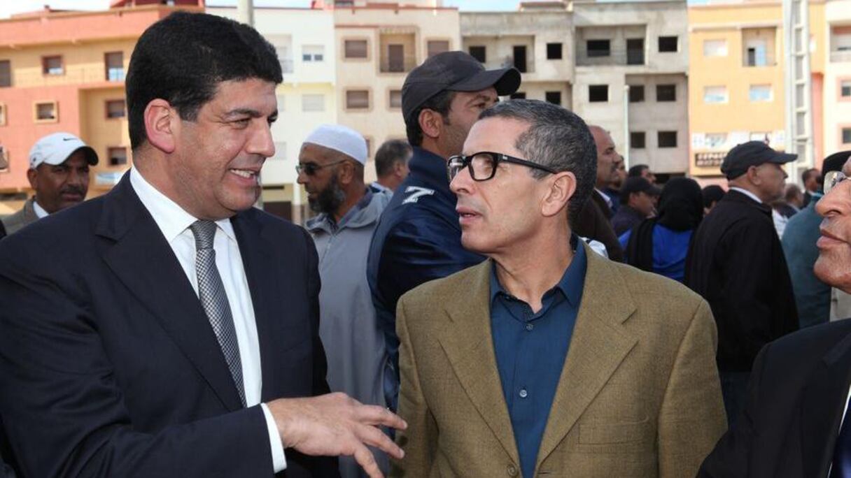 الأمين العام لحزب الأصالة والمعاصرة، مصطفى الباكوري في حديث جانبي مع الوزير السابق، محمد عامر
