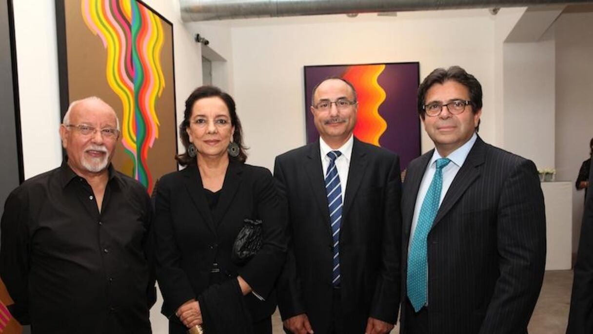 المليحي إلى جانب سعيدة العمراني وجمال المريني مدير عام مصرف المغرب وبالدوميرو فالفيردي رئيس مصرف المغرب
